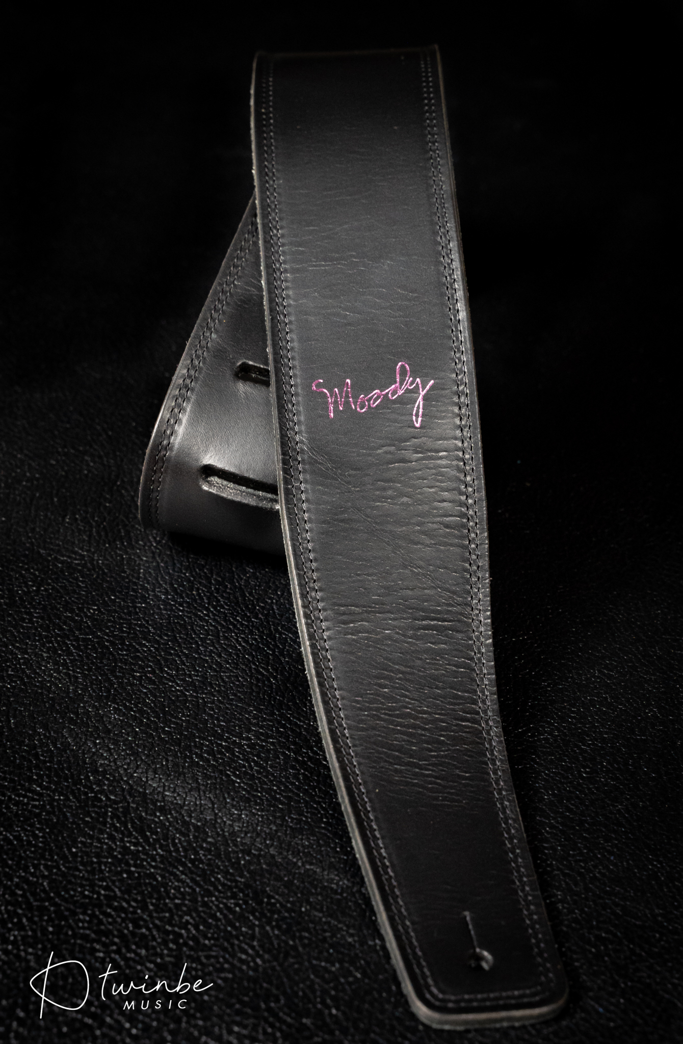 Moody 2.5″ LEATHER BACKED GUITAR STRAP – BLACK/CREAM-PINK LOGO
